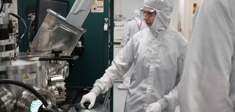 Nathaniel Crispel, a student from the TST-BOCES New Visions Engineering Program, trains with instruments inside the Cornell NanoScale Science and Technology Facility cleanroom.  Photo credit: Chelsea Blovat