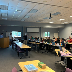 David demonstrating VR teaching methods to educators